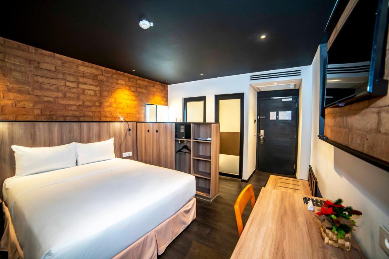Onomo Hotel Дуала Екстериор снимка